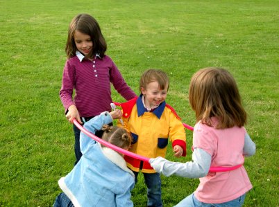 Children Playing Together At School