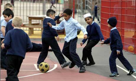 Children Playing Together At School