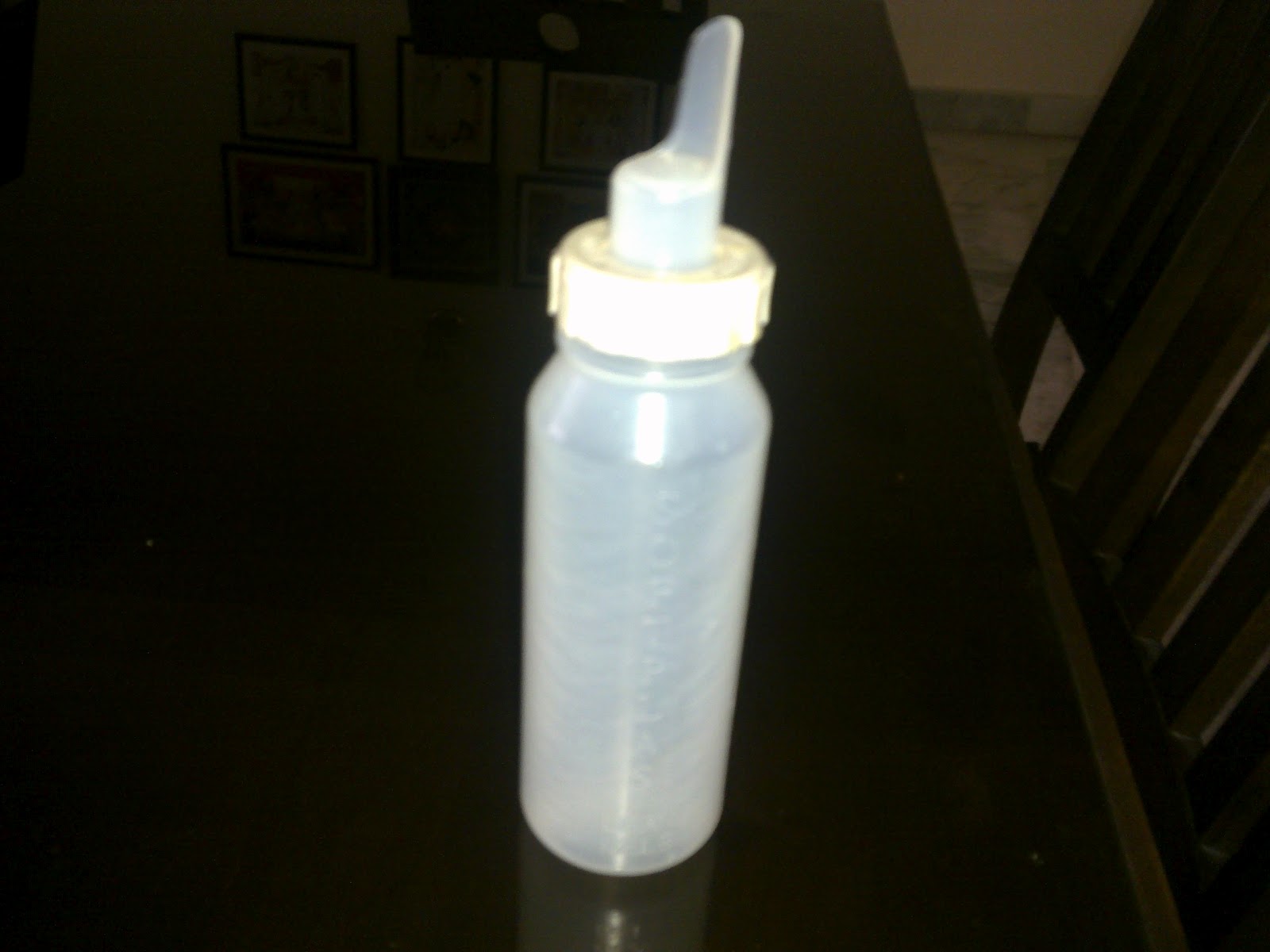 Feeding Bottle With Spoon Feeder