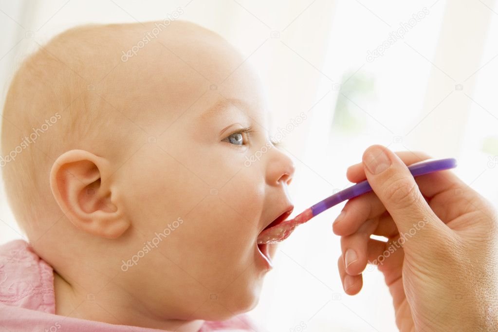 Mother Feeding Baby Pictures