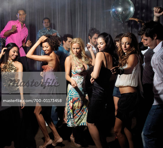 People Dancing At A Party