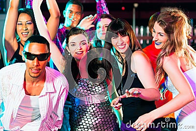 People Dancing At A Party