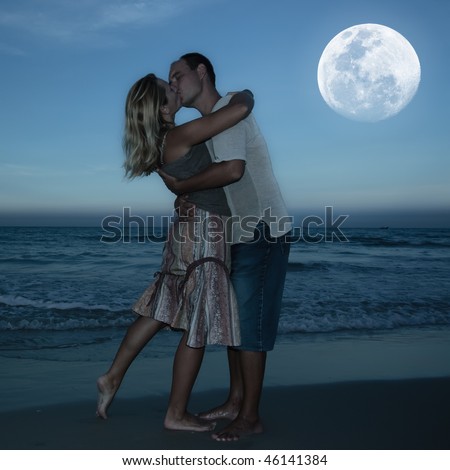 People Kissing On The Beach