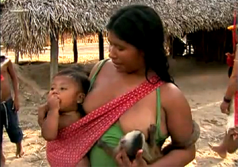 Women Breastfeeding Animals Photos
