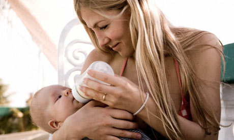 Women Breastfeeding Man