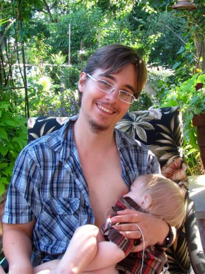 Women Breastfeeding Man